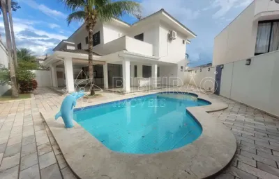 Sobrado com 03 suítes com piscina no condomínio nova aliança sul