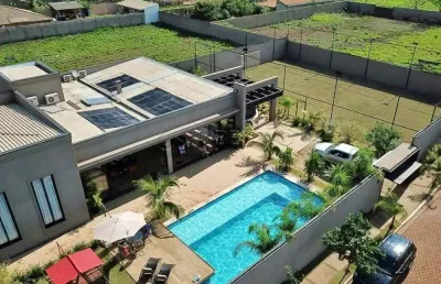 Chácara em jardinópolis com04 suites, armários planejados, ar condicionado, varanda gourmet, churrasqueira, piscina, campo de futebol, playground.