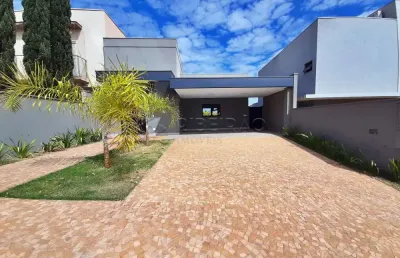 Casa térrea em condomínio no bairro vista bella com  03 suítes, armários planejados, piscina varanda gourmet com churrasqueira.