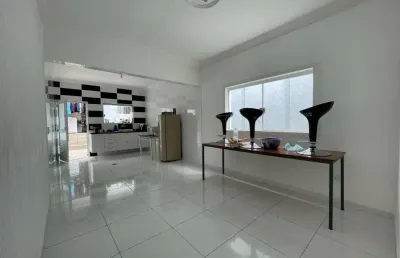 Sobrado amplo com edícula, 3 dormitórios (1 suíte) e garagem fechada para até 2 carros, 160 m² - ar
