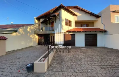 Sobrado para locação com 5 quartos, cozinha com armários, churrasqueira e garagem para 4 carros - 3