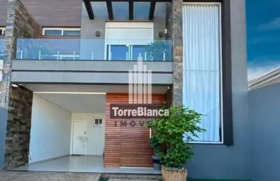 Sobrado à venda, 3 dormitórios (1 suíte), cozinha planejada, área gourmet e 2 vagas de garagem