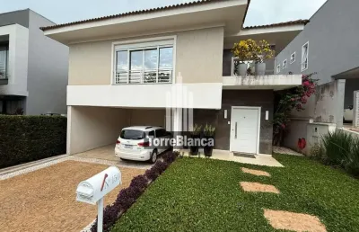 Casa mobiliada para locação ou venda, 3 suítes, 4 banheiros, 2 vagas cobertas, 335m², condomínio la