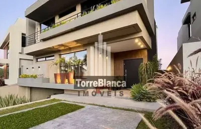 Casa alto padrão à venda no terras alphaville – 3 suítes com varanda, sendo 1 master