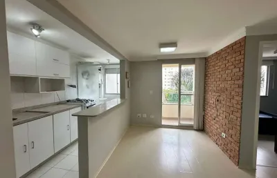 Apartamento semi-mobiliado com 2 quartos 1 suíte e 1 vaga no portão