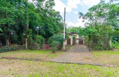 Terreno amplo com casa habitável , na rs 020 ,ao lado do sitio laranjal