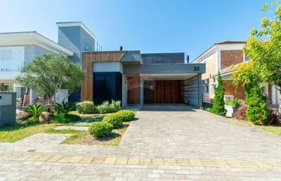 Casa em condomínio fechado com 3 quartos para alugar no Alphaville, Gravataí 