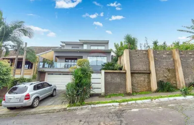 Casa com 3 quartos à venda na Rua João Carlos Linck, 140, Loteamento Jardim Timbaúva, Gravataí