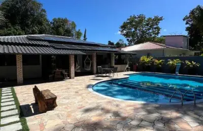 Casa em condomínio fechado com 5 quartos à venda na bairro coroa vermelha, 9630, coroa vermelha, santa cruz cabrália, 450 m2 por r$ 1.800.000