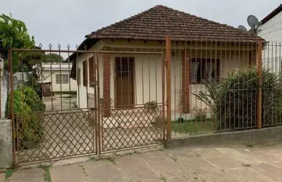 Vendo terreno com 400m² com 2 casas com dois dormitórios cada.