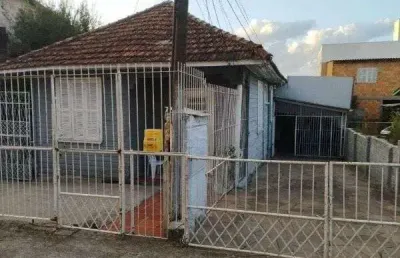 Ótima oportunidade de investimento. terreno com 3 casas com entradas independent