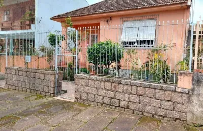 Casa com 3 quartos à venda na Rua Sebastião Wolf, 160, Nonoai, Porto Alegre