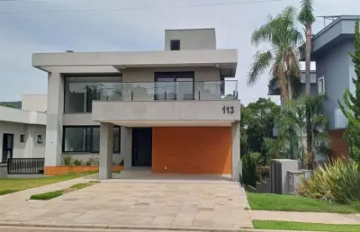 Linda casa alto padrão 4 suítes 349m² cond. alphaville toscana