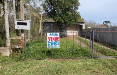 Terreno com 370 m2 ,e duas casas independentes 80m2 e 50m2 no campo novo