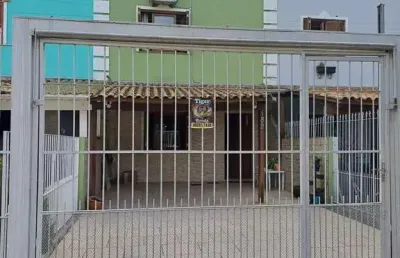Casa com 4 quartos à venda na Rua Cangussu, 189, Nonoai, Porto Alegre