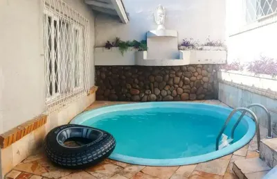 Casa com 3 quartos à venda na Rua Peri Melo, 120, Nonoai, Porto Alegre