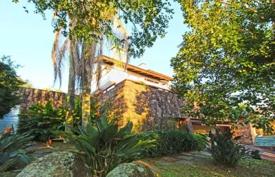 Casa com 4 quartos à venda na Rua Dona Lida Monteiro, 180, Teresópolis, Porto Alegre