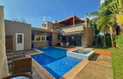 Casa térrea com 405m², 4 quartos/suítes, no condomínio ipê amarelo em ribeirão preto/sp i imobiliária brioni imóveis