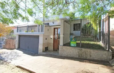 Casa com 3 quartos à venda na rua gustavo schmidt, 615, três figueiras, porto alegre, 309 m2 por r$ 1.400.000