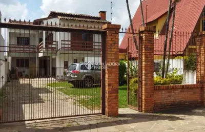 Casa com 7 quartos à venda na rua general telino chagastelles, 75, parque santa fé, porto alegre, 270 m2 por r$ 628.000