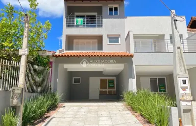 Casa com 3 quartos à venda na rua ari peixoto martins, 146, espírito santo, porto alegre, 182 m2 por r$ 630.000