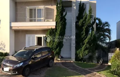 Casa em condomínio fechado com 4 quartos à venda na avenida edgar pires de castro, 540, campo novo, porto alegre, 178 m2 por r$ 1.070.000