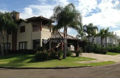 Casa em condomínio fechado com 3 quartos à venda na rua cati, 140, alphaville, gravataí, 380 m2 por r$ 3.200.000