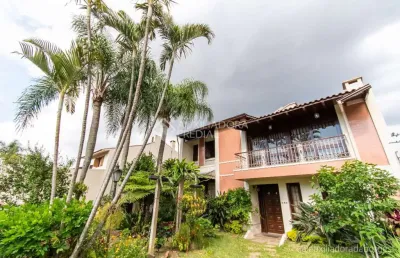 Casa com 4 quartos à venda na rua upamaroti, 836, cristal, porto alegre, 400 m2 por r$ 1.390.000
