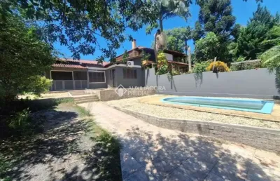 Casa em condomínio fechado com 2 quartos à venda na avenida senador salgado filho, 6614, são lucas, viamão, 112 m2 por r$ 550.000