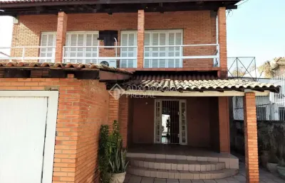 Casa em condomínio fechado com 3 quartos à venda na rua coronel neves, 472, medianeira, porto alegre, 450 m2 por r$ 1.600.000