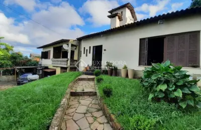 Casa em condomínio fechado com 5 quartos à venda na rua são cristiano, 67, santa tereza, porto alegre, 399 m2 por r$ 750.000