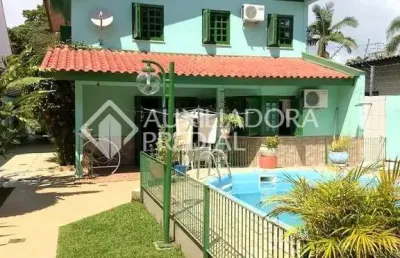 Casa em condomínio fechado com 4 quartos à venda na rua mura, 50, guarujá, porto alegre, 297 m2 por r$ 750.000