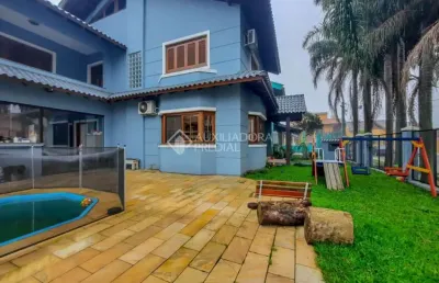 Casa em condomínio fechado com 4 quartos à venda na rua doutor ladislau ruttkay, 16, sarandi, porto alegre, 332 m2 por r$ 1.250.000