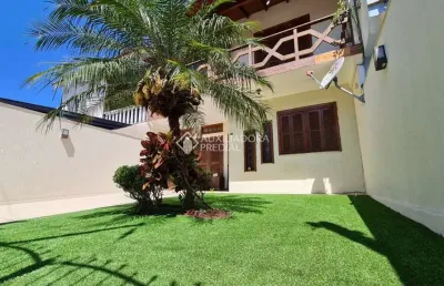 Casa com 3 quartos à venda na rua dos quero queros, 576, jardim algarve, alvorada, 170 m2 por r$ 790.000