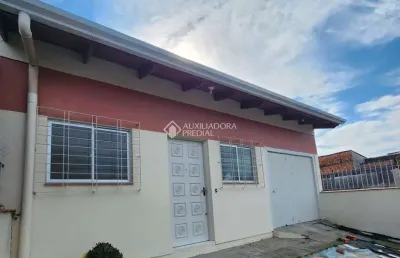 Casa com 3 quartos à venda na quarenta e três, 53, jardim algarve, alvorada, 123 m2 por r$ 349.900