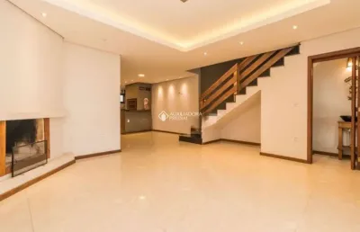 Casa com 3 quartos à venda na rua dom jaime de barros câmara, 705, sarandi, porto alegre, 230 m2 por r$ 1.090.000