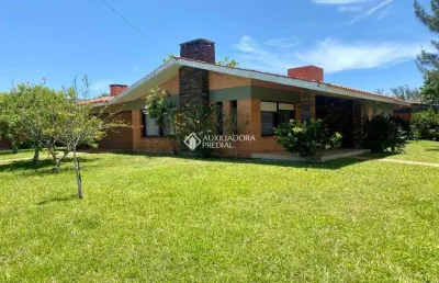 Casa com 4 quartos à venda na rua rio jacuí, 1104, centro, xangri-lá, 218 m2 por r$ 1.698.000