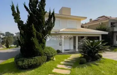 Casa em condomínio fechado com 3 quartos à venda na avenida senador salgado filho, 8500, querência, viamão, 208 m2 por r$ 1.690.000