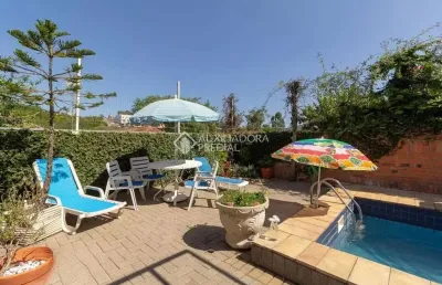 Casa com 4 quartos à venda na rua doutor paulino guerra, 575, jardim itu sabará, porto alegre, 345 m2 por r$ 1.300.000