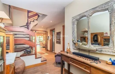 Casa em condomínio fechado com 3 quartos à venda na rua osório tuyuty de oliveira freitas, 120, três figueiras, porto alegre, 313 m2 por r$ 3.200.000