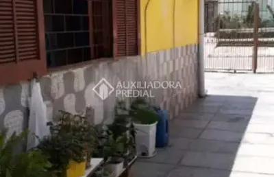Casa com 4 quartos à venda na rua cento e trinta e cinco, 385, jardim algarve, alvorada, 98 m2 por r$ 270.000