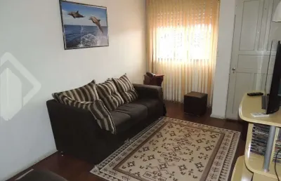 Casa em condomínio fechado com 3 quartos à venda na rua gildo de freitas, 56, jardim algarve, alvorada, 114 m2 por r$ 265.000