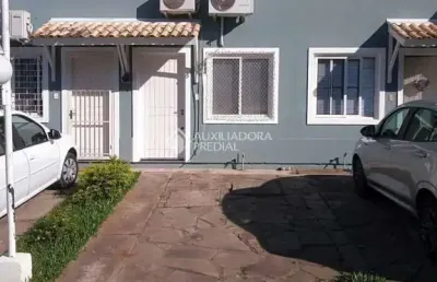 Casa em condomínio fechado com 2 quartos à venda na rua ney da gama ahrends, 219, protásio alves, porto alegre, 79 m2 por r$ 330.000