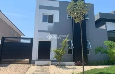 Casa em condomínio fechado com 3 quartos à venda na avenida senador salgado filho, 8500, jardim krahe, viamão, 220 m2 por r$ 1.500.000