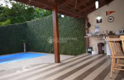 Casa em condomínio fechado com 3 quartos à venda na rua altos da amapá, 105, vila nova, porto alegre, 300 m2 por r$ 1.360.000