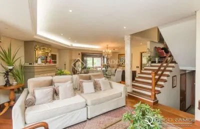Casa em condomínio fechado com 6 quartos à venda na rua gustavo schmidt, 277, três figueiras, porto alegre, 445 m2 por r$ 2.999.000