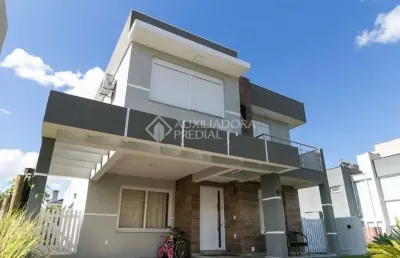 Casa em condomínio fechado com 3 quartos à venda na avenida senador salgado filho, 8500, querência, viamão, 210 m2 por r$ 1.600.000