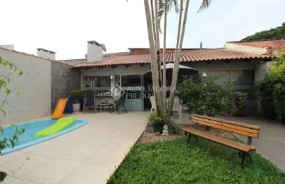 Casa com 3 quartos à venda na rua gregório da fonseca, 509, nonoai, porto alegre, 215 m2 por r$ 749.000
