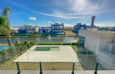 Casa em condomínio fechado com 4 quartos à venda na circulação, 720, centro, xangri-lá, 227 m2 por r$ 2.300.000