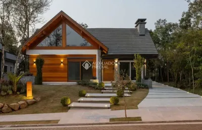 Casa em condomínio fechado com 3 quartos à venda na braemar, 280, pórtico, gramado, 300 m2 por r$ 3.300.000